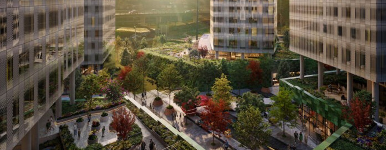 An urban landscape featuring modern buildings surrounded by lush gardens and trees, where people are walking and relaxing.