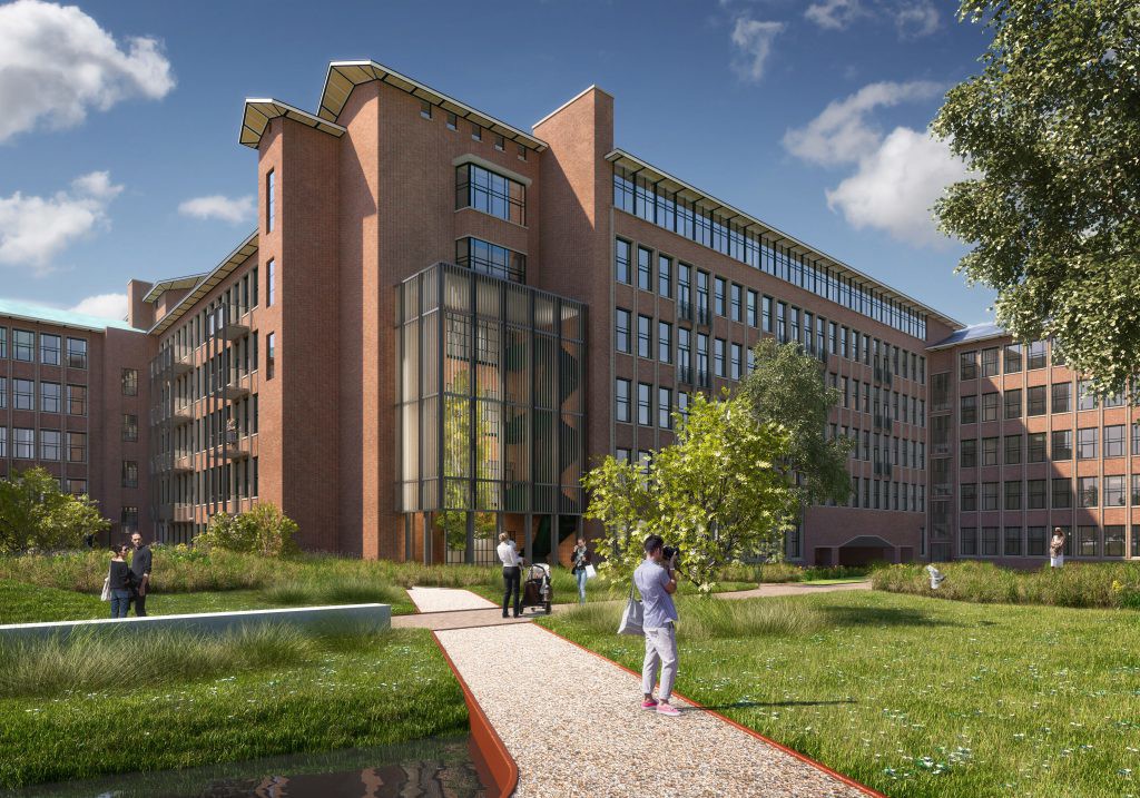 Modern kantoorgebouw met glazen ingang, omgeven door groen, waar mensen wandelen en van het landschap genieten.