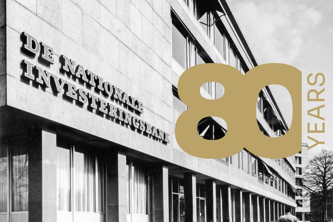 Historical black-and-white photo of the National Investment Bank building featuring the text 80 YEARS in gold letters.