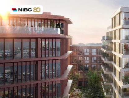 Modern buildings with large windows, a green courtyard, and people on balconies in a sunny urban setting.